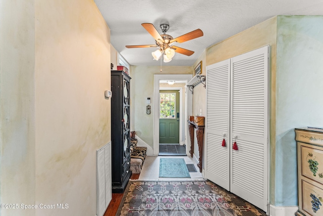 2109 Indian River Dr, Cocoa, FL 32922 - entryway with a ceiling fan and wood finished floors