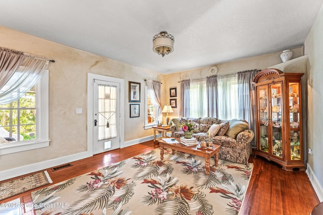 2109 Indian River Dr, Cocoa, FL 32922 - living area with wood finished floors and baseboards