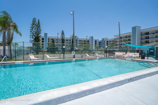 pool featuring fence