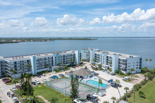 birds eye view of property featuring a water view