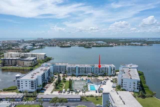 aerial view with a water view and a city view