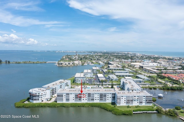 aerial view with a water view and a city view