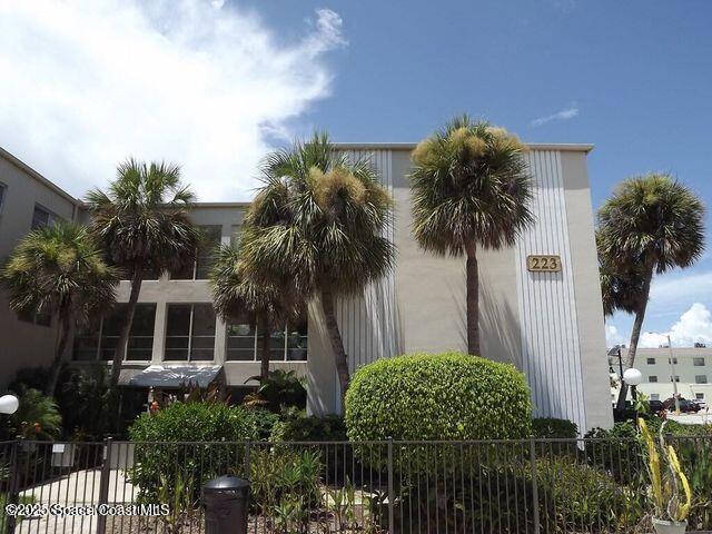 view of property featuring fence