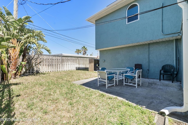 view of yard with a patio area and fence