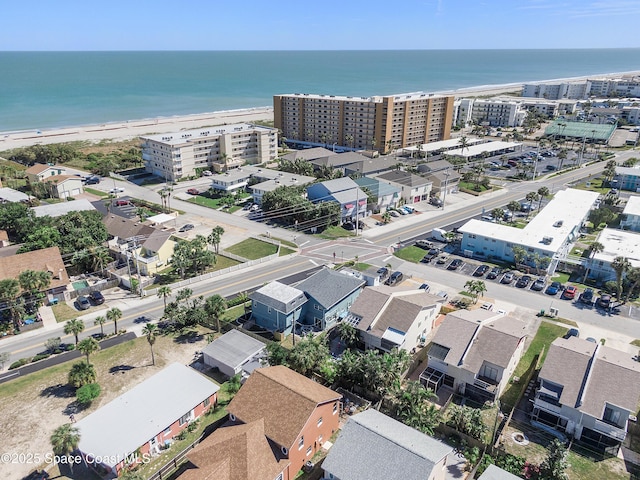 bird's eye view featuring a water view and a city view