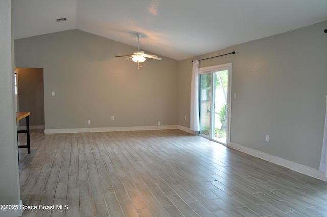 6110 Grissom Pkwy, Cocoa, FL 32927 - unfurnished room featuring ceiling fan, visible vents, baseboards, lofted ceiling, and light wood-style floors