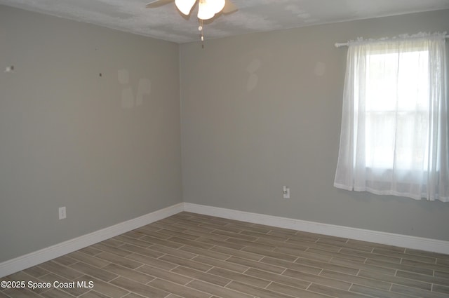 6110 Grissom Pkwy, Cocoa, FL 32927 - spare room with ceiling fan, baseboards, and wood finished floors