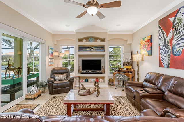 living room featuring ceiling fan, tile patterned flooring, and crown molding