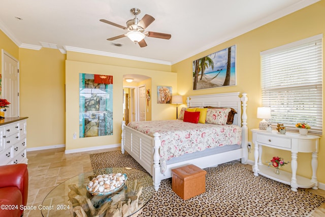 bedroom with visible vents, arched walkways, baseboards, stone finish floor, and ornamental molding