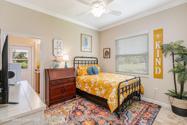 bedroom with ceiling fan, baseboards, and crown molding