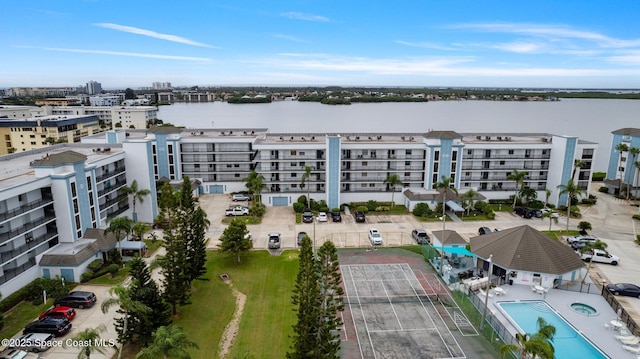 birds eye view of property featuring a water view