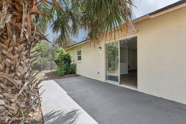 view of patio with fence