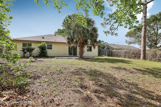 view of yard with a patio and fence