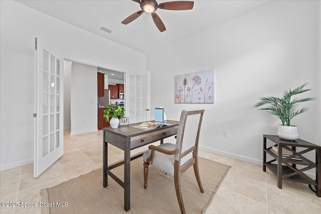 office area with french doors, light tile patterned floors, visible vents, ceiling fan, and baseboards