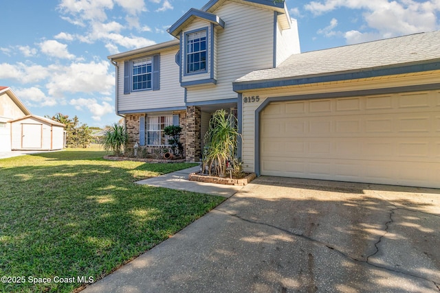 view of front facade featuring an attached garage, driveway, a front lawn, and a storage unit