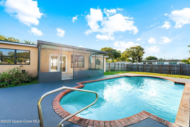 view of swimming pool featuring a fenced in pool, a patio area, and a fenced backyard