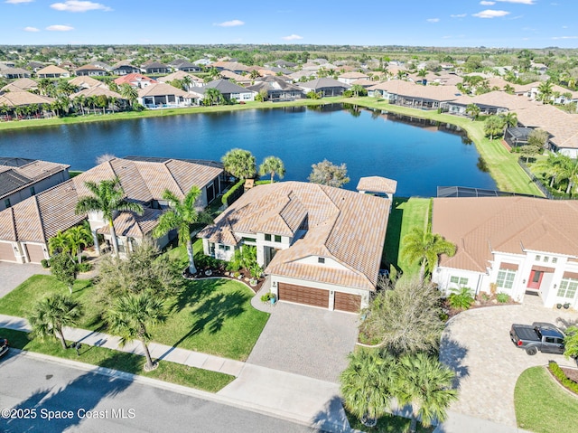 3882 Durksly Dr, Melbourne, FL 32940 - drone / aerial view with a residential view and a water view