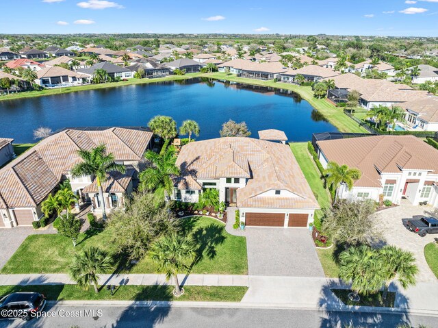 3882 Durksly Dr, Melbourne, FL 32940 - birds eye view of property featuring a water view and a residential view