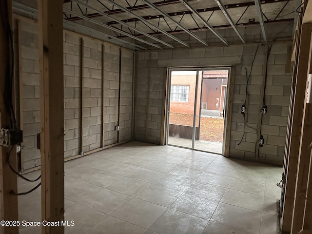 empty room with concrete block wall