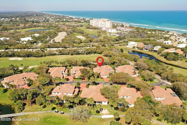 bird's eye view with a water view and a residential view