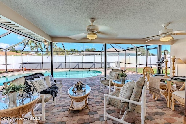 interior space featuring a pool and a ceiling fan