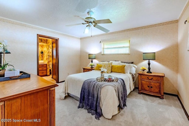 bedroom featuring crown molding, baseboards, a ceiling fan, and light colored carpet