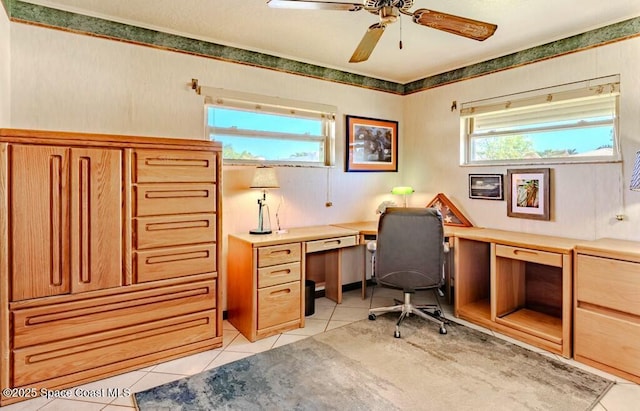 home office with ceiling fan and light tile patterned floors