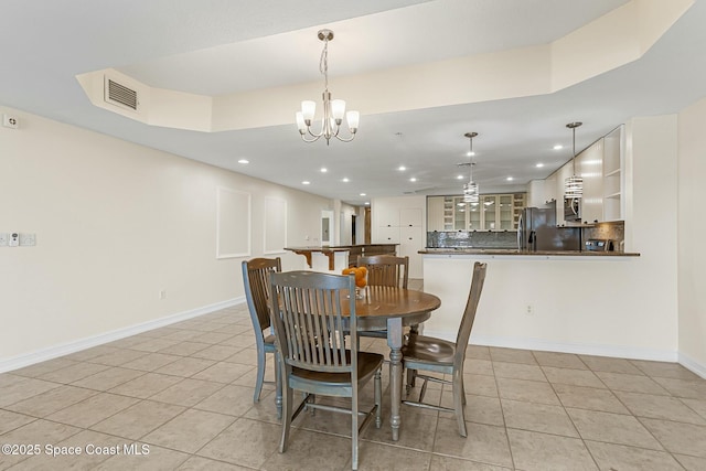 dining space with recessed lighting, light tile patterned flooring, visible vents, and baseboards