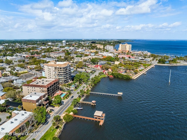 drone / aerial view with a water view and a view of city