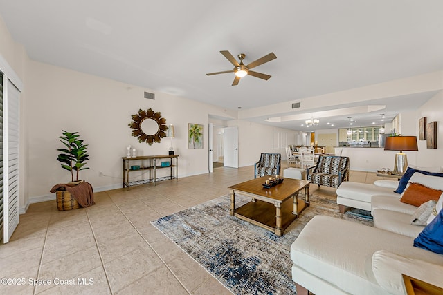 29 Riverside Dr Unit 402, Cocoa, FL 32922 - living area with ceiling fan and light tile patterned floors