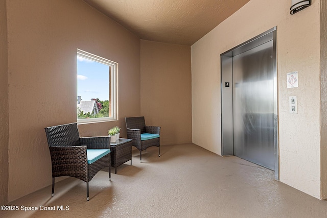 29 Riverside Dr Unit 402, Cocoa, FL 32922 - living area featuring elevator