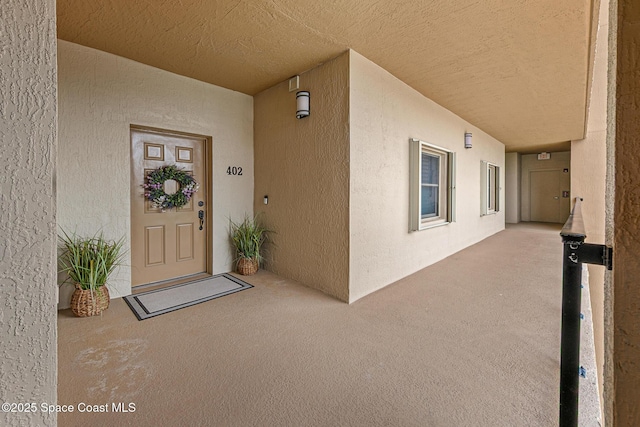 29 Riverside Dr Unit 402, Cocoa, FL 32922 - entrance to property featuring stucco siding