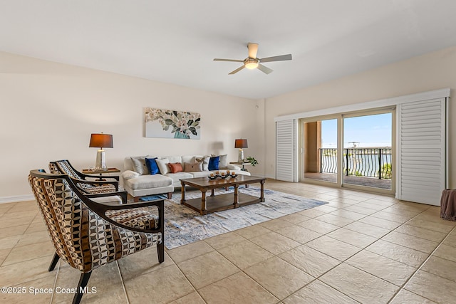 29 Riverside Dr Unit 402, Cocoa, FL 32922 - living room with ceiling fan and light tile patterned floors