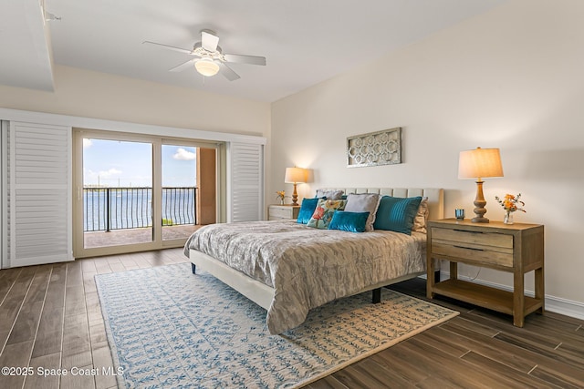 29 Riverside Dr Unit 402, Cocoa, FL 32922 - bedroom with access to exterior, wood finished floors, and a ceiling fan