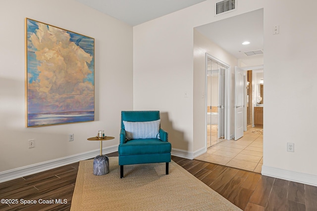 29 Riverside Dr Unit 402, Cocoa, FL 32922 - sitting room with wood finished floors and recessed lighting