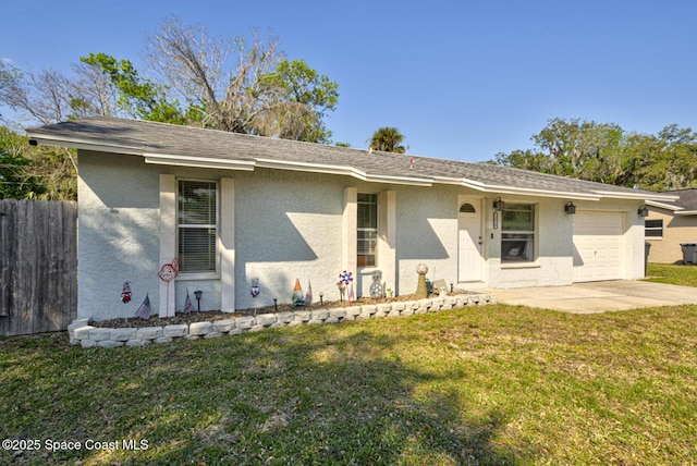 ranch-style home with a garage, fence, a front lawn, and stucco siding