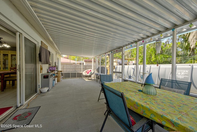 view of patio with outdoor dining space and a fenced backyard