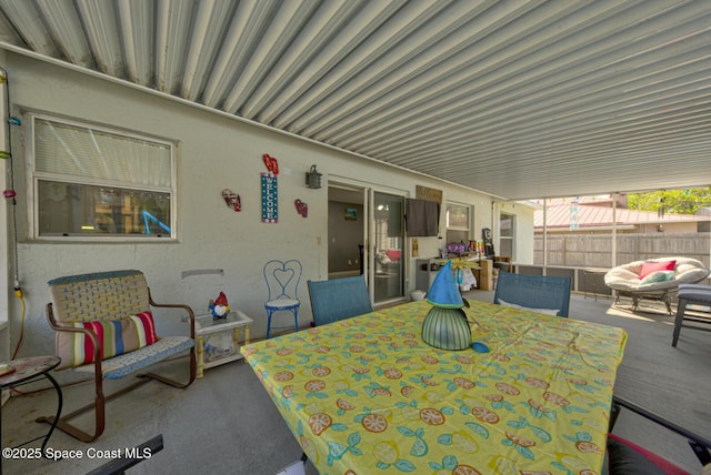 view of patio / terrace with outdoor dining area, outdoor lounge area, and fence