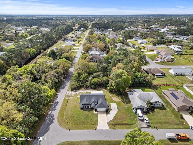 drone / aerial view with a residential view