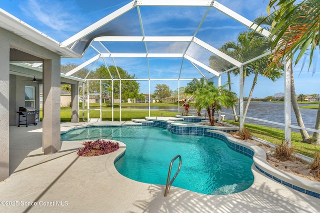 view of pool featuring a yard, a water view, grilling area, a patio area, and a lanai