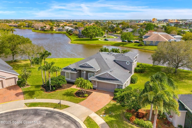 aerial view featuring a residential view and a water view