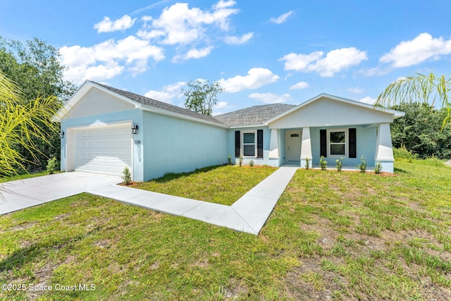 single story home with a garage, a front yard, concrete driveway, and stucco siding