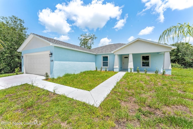 2100 Cogan Dr SE, Palm Bay, FL 32909 - ranch-style house featuring stucco siding, concrete driveway, a garage, and a front yard