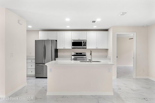 2100 Cogan Dr SE, Palm Bay, FL 32909 - kitchen featuring a sink, marble finish floor, and appliances with stainless steel finishes