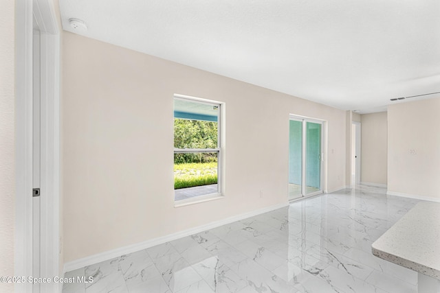2100 Cogan Dr SE, Palm Bay, FL 32909 - unfurnished room featuring visible vents, baseboards, and marble finish floor