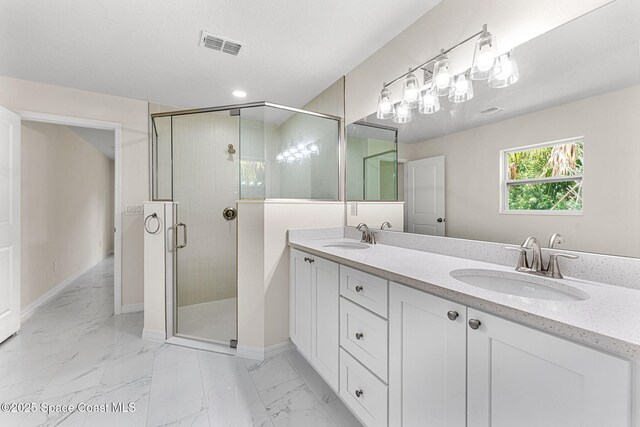2100 Cogan Dr SE, Palm Bay, FL 32909 - bathroom with visible vents, marble finish floor, and a sink