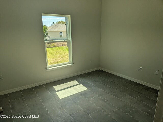 2100 Cogan Dr SE, Palm Bay, FL 32909 - empty room featuring baseboards