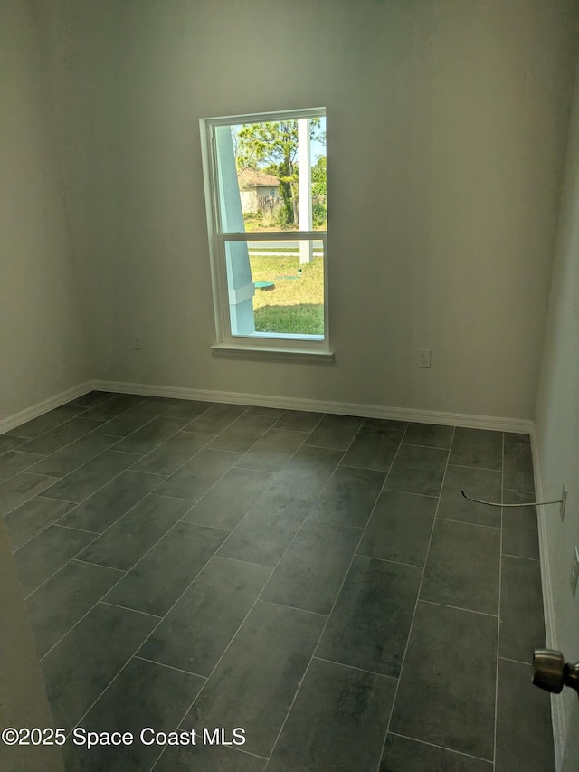 2100 Cogan Dr SE, Palm Bay, FL 32909 - unfurnished room featuring baseboards