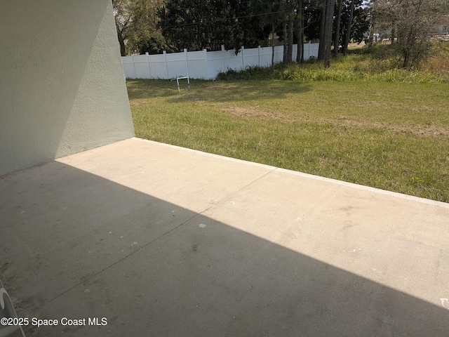 2100 Cogan Dr SE, Palm Bay, FL 32909 - view of yard with a patio area and fence