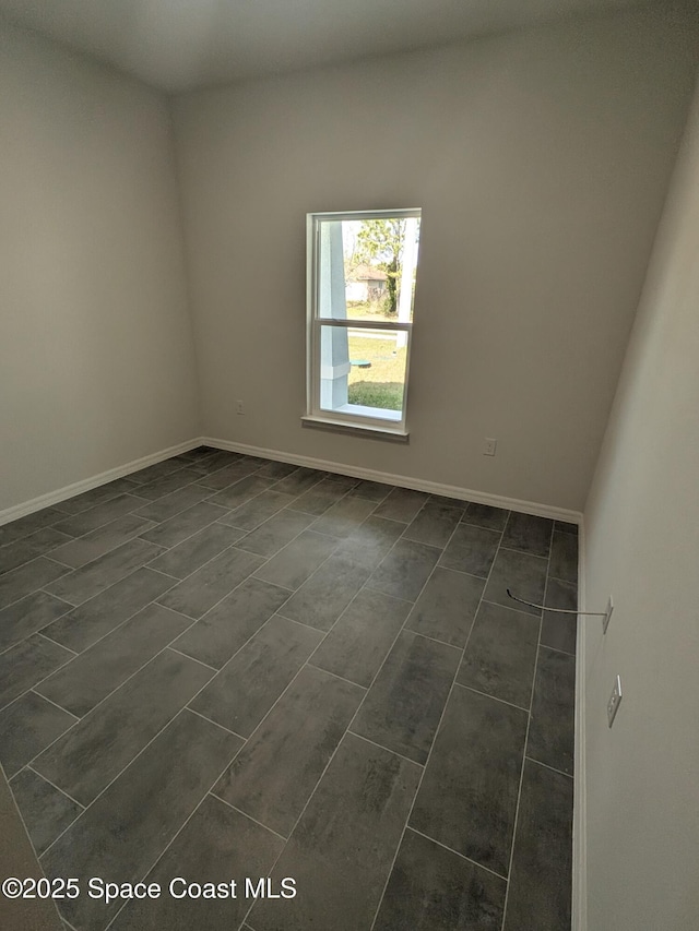 2100 Cogan Dr SE, Palm Bay, FL 32909 - unfurnished room featuring baseboards